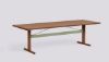 Picture of PASSERELLE TABLE WATER-BASED LACQUERED WALNUT FRAME THYME GREEN POWDER COATED CROSSBAR ADJUSTABLE GLIDERS-L260 X W95 X H74 4 LEGS-WATER-BASED LACQUERED WALNUT VENEER TABLETOP WATER-BASED LACQUERED SOLID WALNUT EDGE, AB761-B587-AI04, HAY